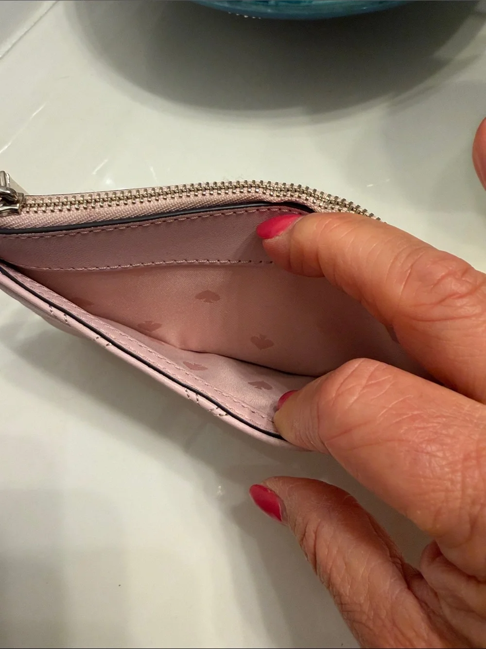 kate spade quilted blush pink card pouch with gold-tone zipper